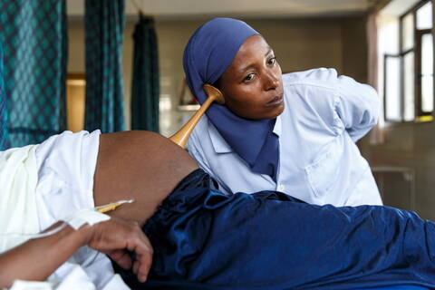 Midwife during examination, Ethiopia Midwife during examination, Ethiopia